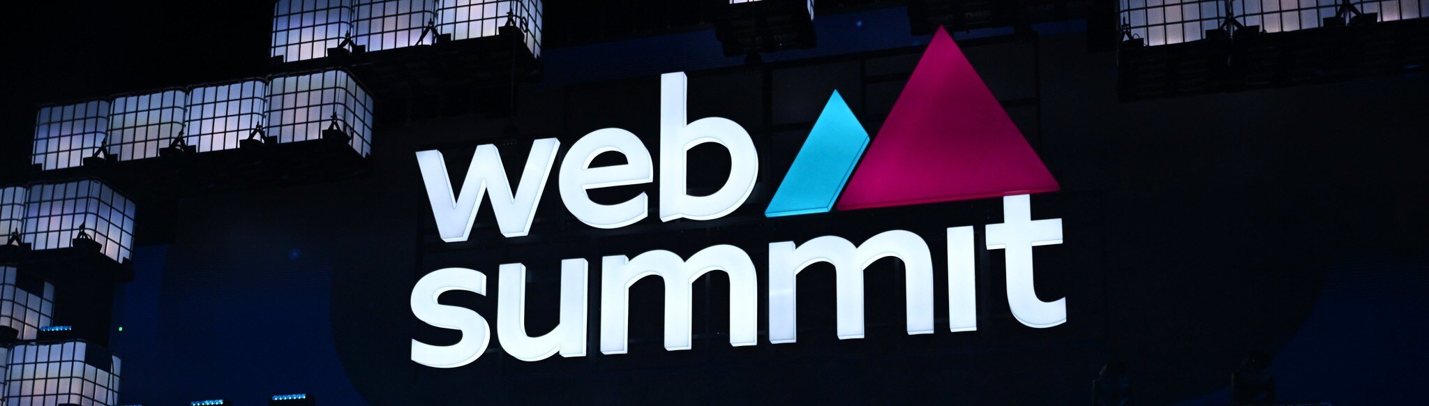 websummit qatar board and logo